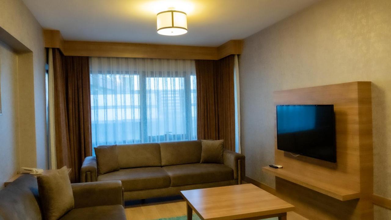 Bursa Suites Apart Otel Exterior foto Living room of a suite at the hotel
